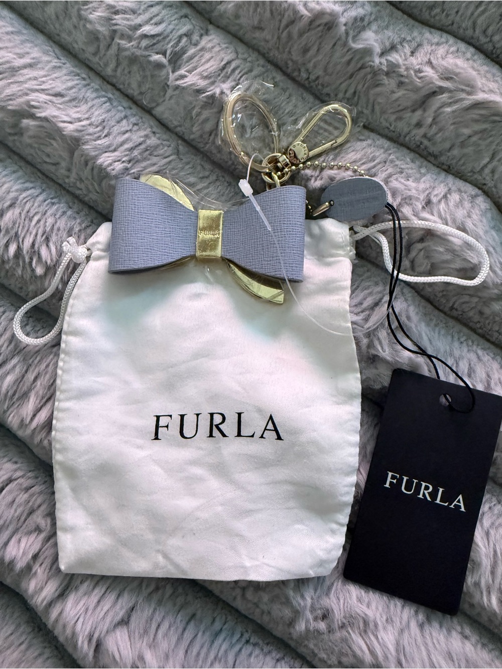 Furla Light Blue-Gray Bow Key Charm with Gold Hardware